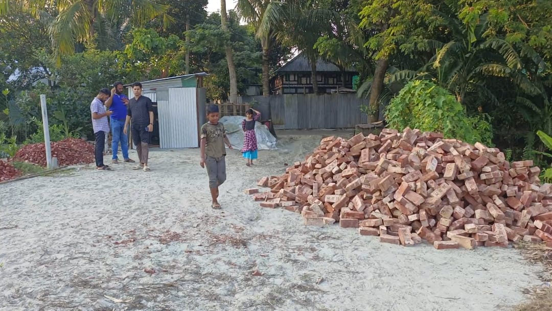 তিতাসে বাড়ি নির্মাণে বাধা ও দখলের চেষ্টা করেন তারই আপন ভাই শাহিন